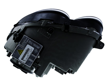 HELLA Headlight Assembly - 007988561