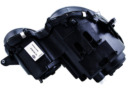 HELLA Headlight Assembly - 008369051