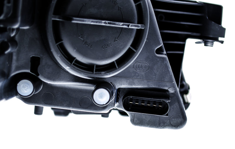 HELLA Headlight Assembly - 008821051