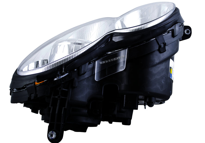 HELLA Headlight Assembly - 009040351
