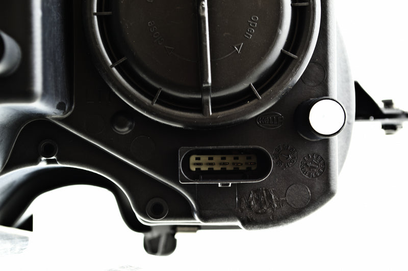 HELLA Headlight Assembly - 009260051