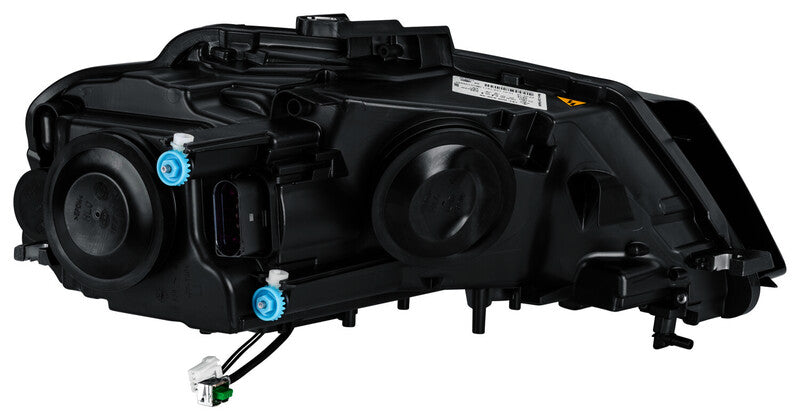 HELLA Headlight Assembly - 009648391