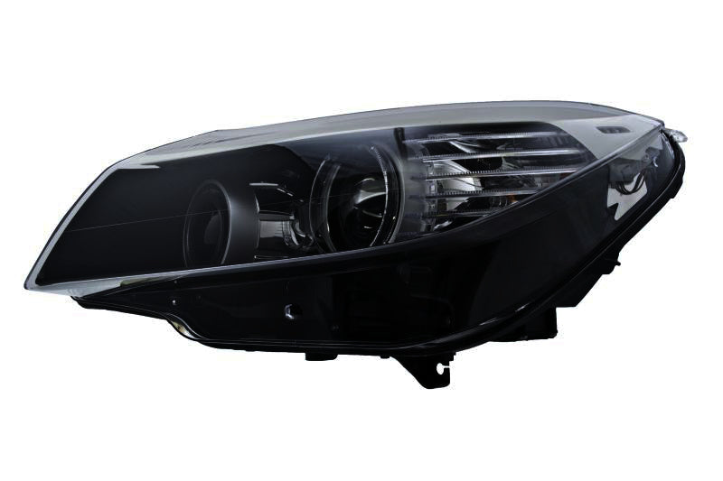 HELLA Headlight Assembly - 009934451