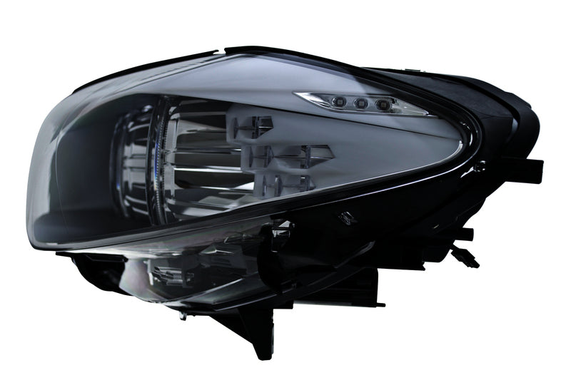 HELLA Headlight Assembly - 010131651