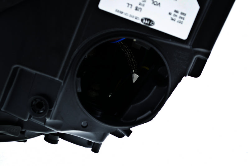HELLA Headlight Assembly - 010131651