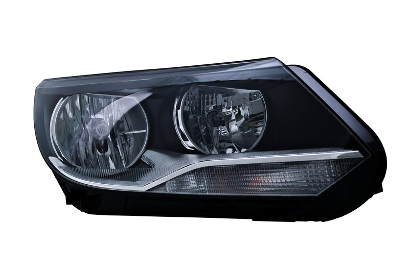 HELLA Headlight Assembly - 010749261