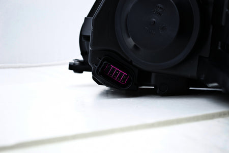 HELLA Headlight Assembly - 010749261