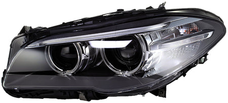HELLA Headlight Assembly - 011087951