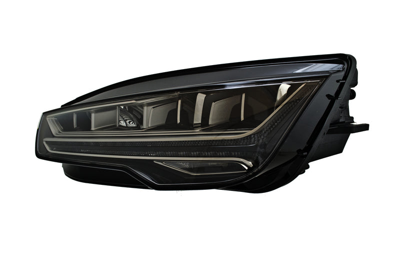 HELLA Headlight Assembly - 011869351