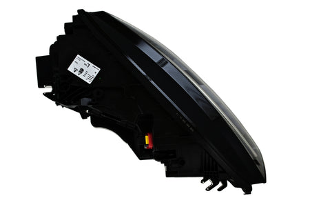 HELLA Headlight Assembly - 011869351