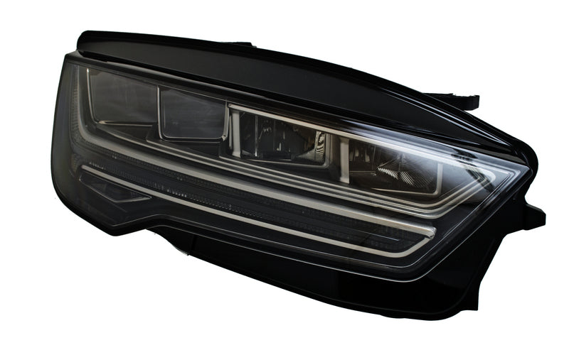 HELLA Headlight Assembly - 011869361