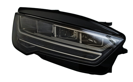 HELLA Headlight Assembly - 011869361