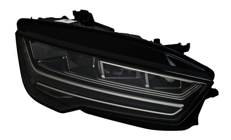HELLA Headlight Assembly - 011869361