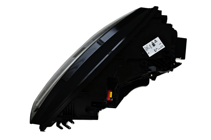 HELLA Headlight Assembly - 011869361