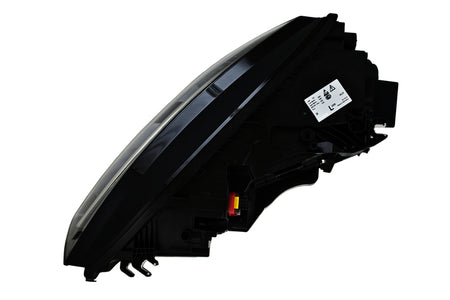 HELLA Headlight Assembly - 011869361