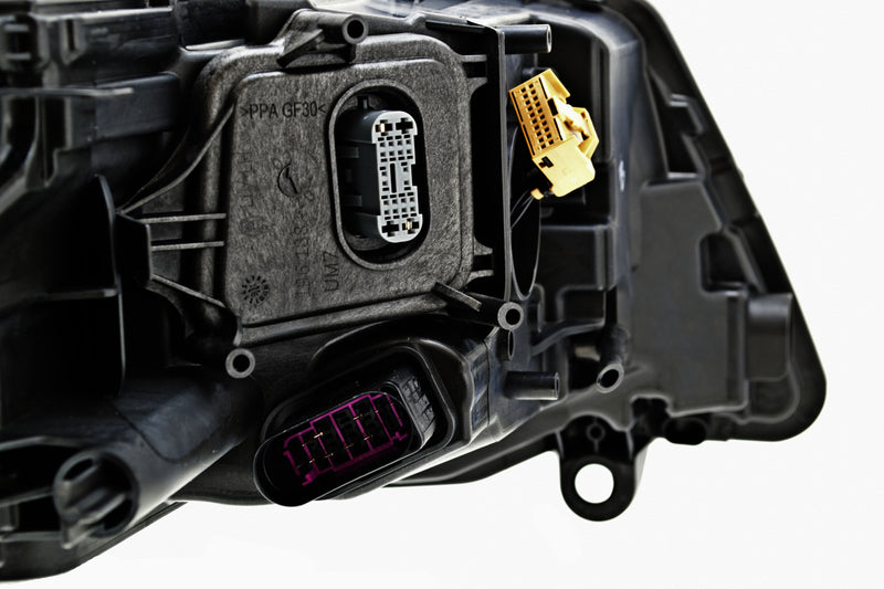 HELLA Headlight Assembly - 011937451