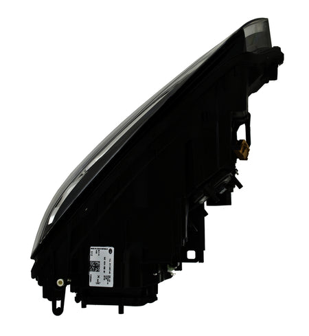 HELLA Headlight Assembly - 011937451