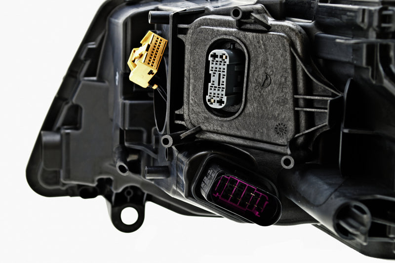 HELLA Headlight Assembly - 011937461
