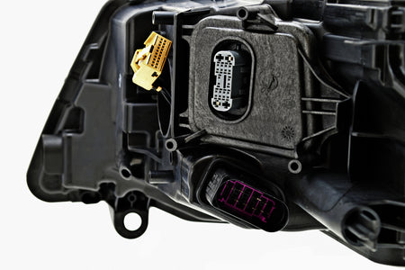 HELLA Headlight Assembly - 011937461