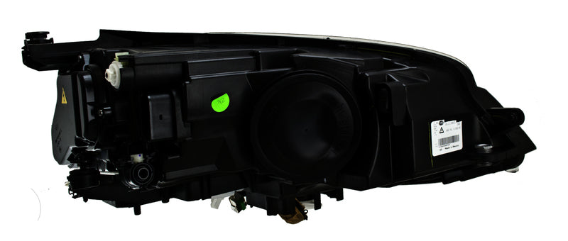 HELLA Headlight Assembly - 011956251