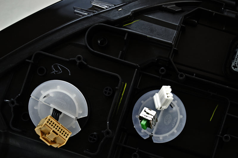 HELLA Headlight Assembly - 011956251