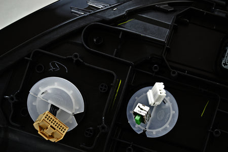 HELLA Headlight Assembly - 011956251