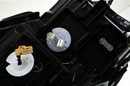 HELLA Headlight Assembly - 011956281