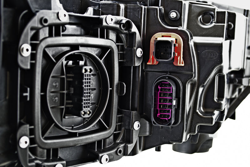 HELLA Headlight Assembly - 012976151