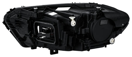 HELLA Headlight Assembly - 015091861