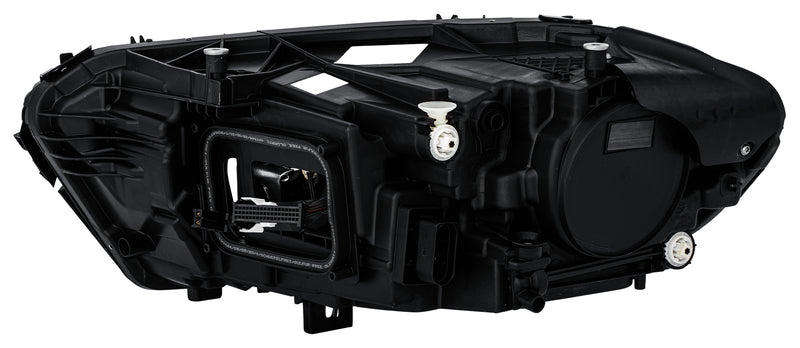 HELLA Headlight Assembly - 015091861