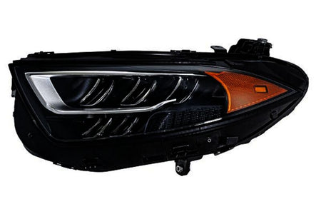 HELLA Headlight Assembly - 015619851