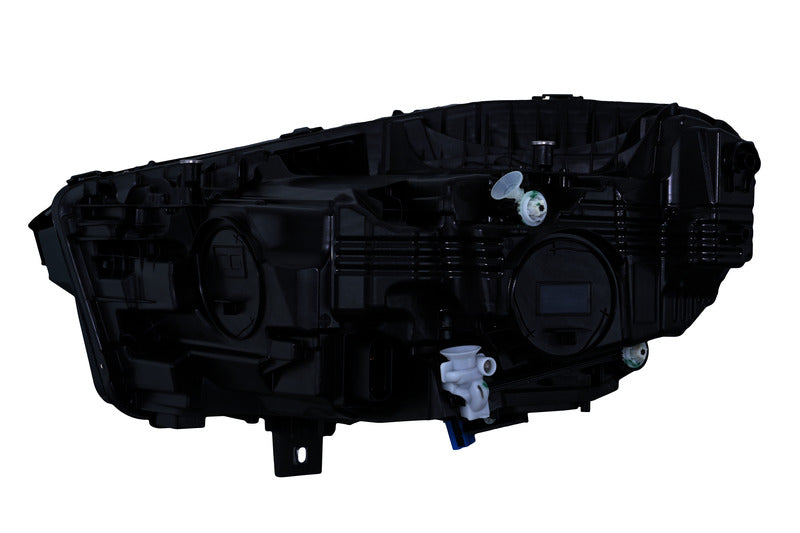 HELLA Headlight Assembly - 015568761