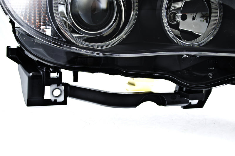 HELLA Headlight Assembly - 160292011
