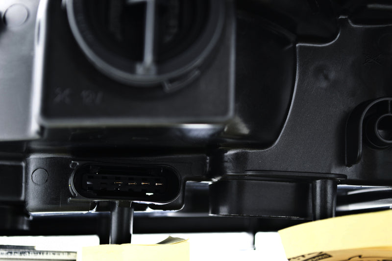 HELLA Headlight Assembly - 263064461