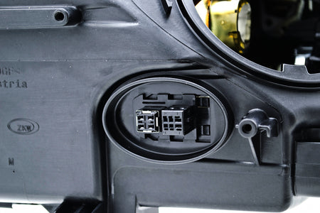 HELLA Headlight Assembly - 354690061