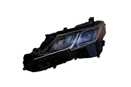 HELLA Headlight Assembly - 354888011