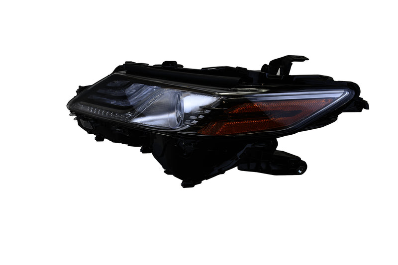 HELLA Headlight Assembly - 354888071