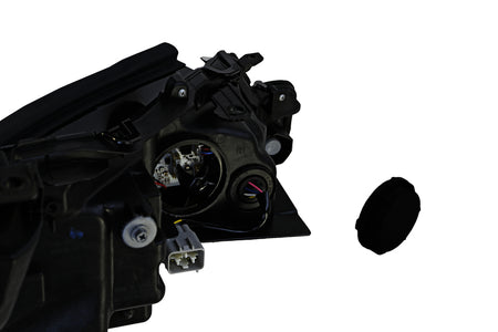 HELLA Headlight Assembly - 354888071