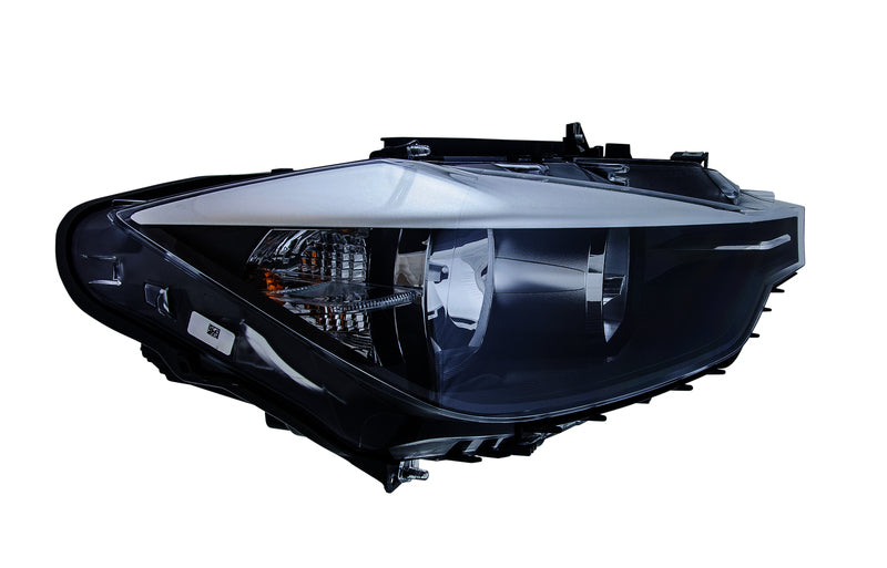 HELLA Headlight Assembly - 354983061