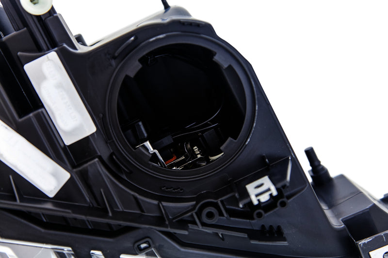 HELLA Headlight Assembly - 354983061