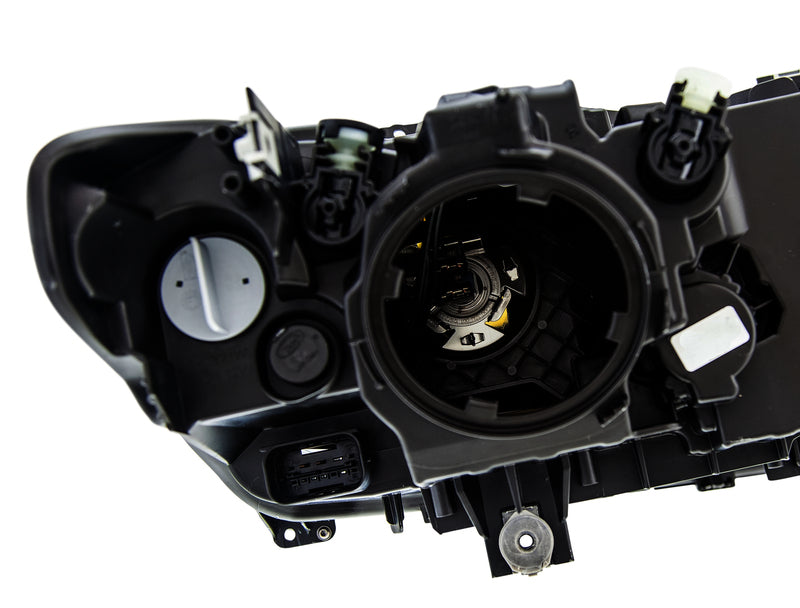 HELLA Headlight Assembly - 354983061