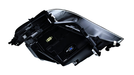 HELLA Headlight Assembly - H11077021